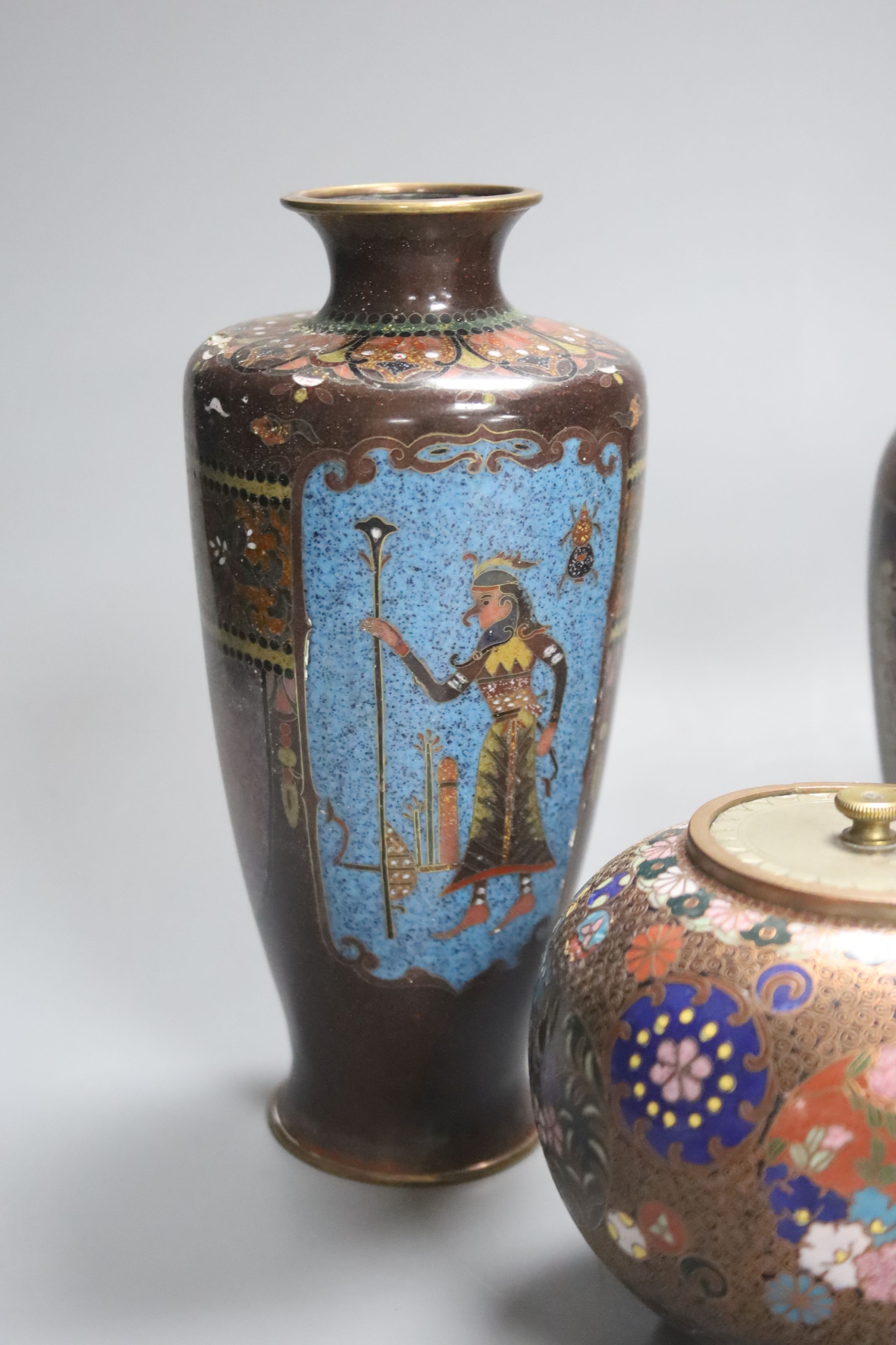 Four Japanese cloisonne vases, together with a similar jar and cover, height 19cm